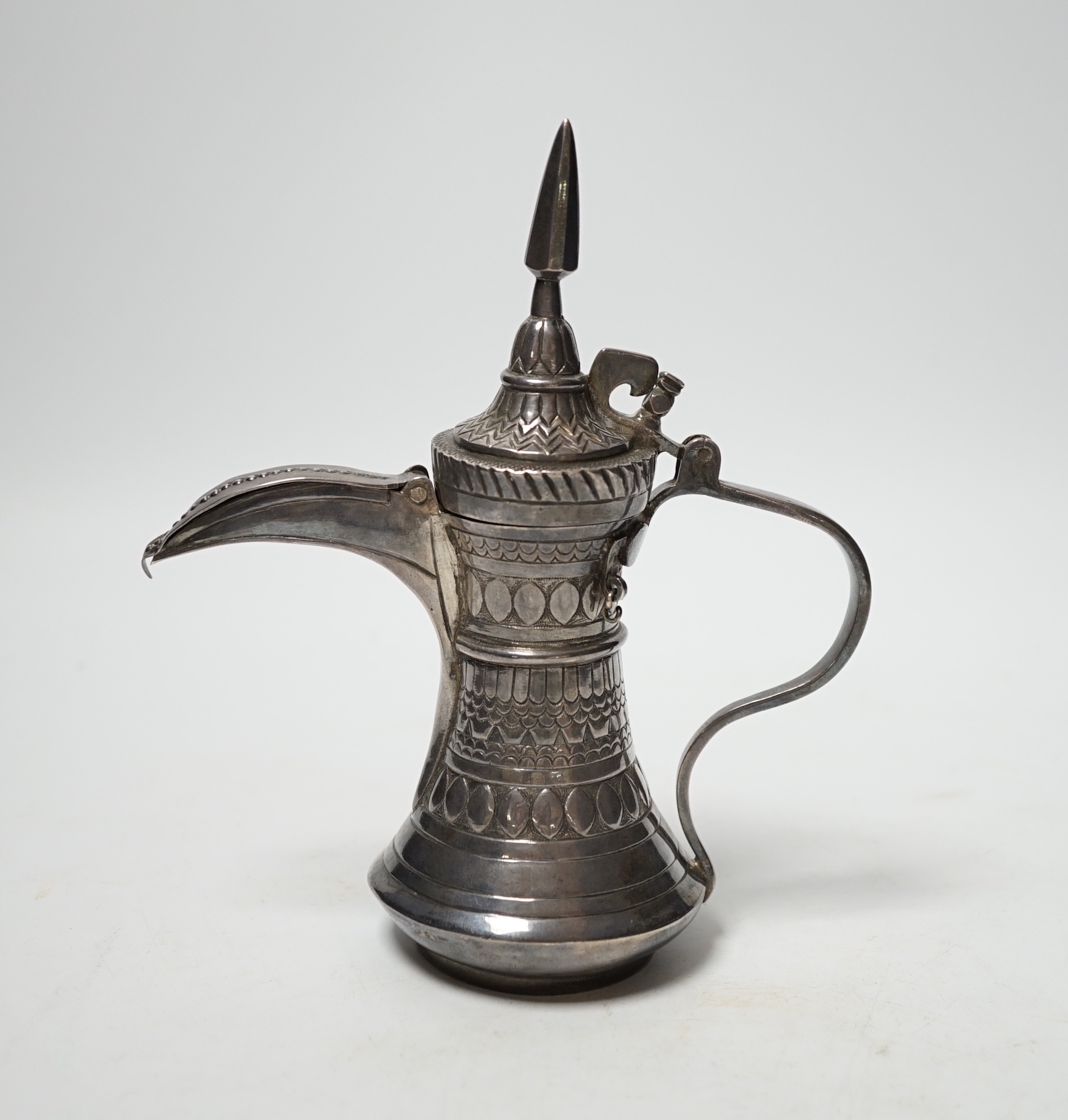 A small Persian white metal dallah, 16cm